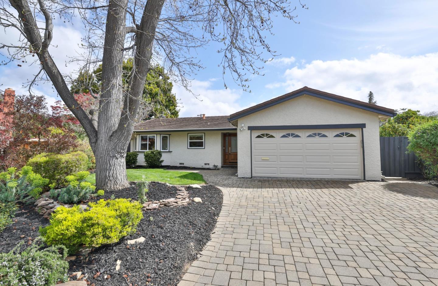 148 Jacinto Way Sunnyvale, CA 94086 - Photo 27 of 27 a front view of a house with a yard and garage