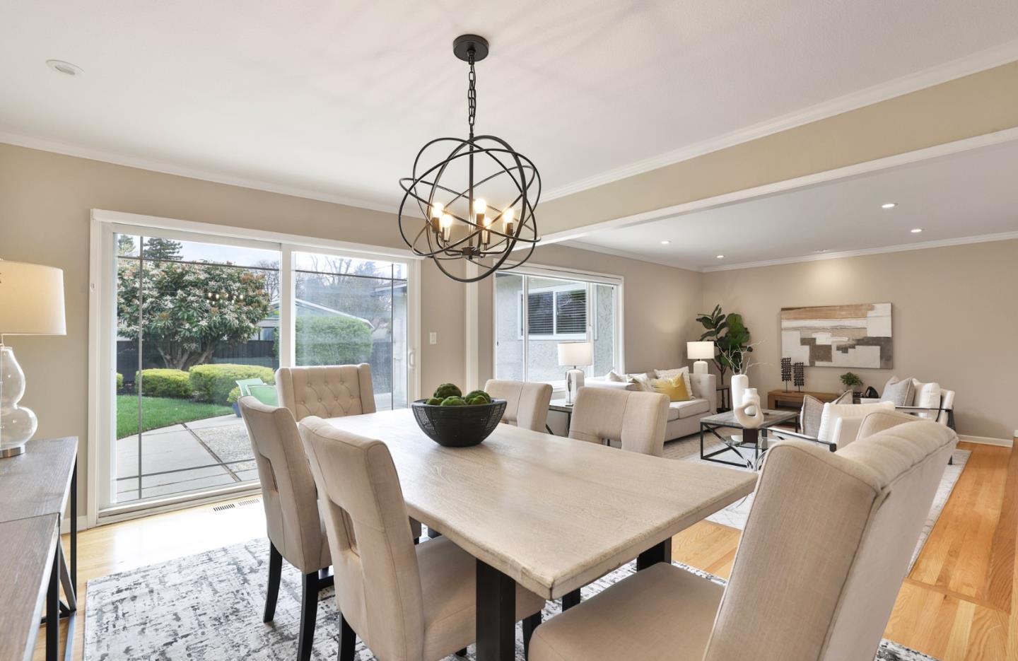 148 Jacinto Way Sunnyvale, CA 94086 - Photo 5 of 27 a view of a dining room with furniture wooden floor and chandelier