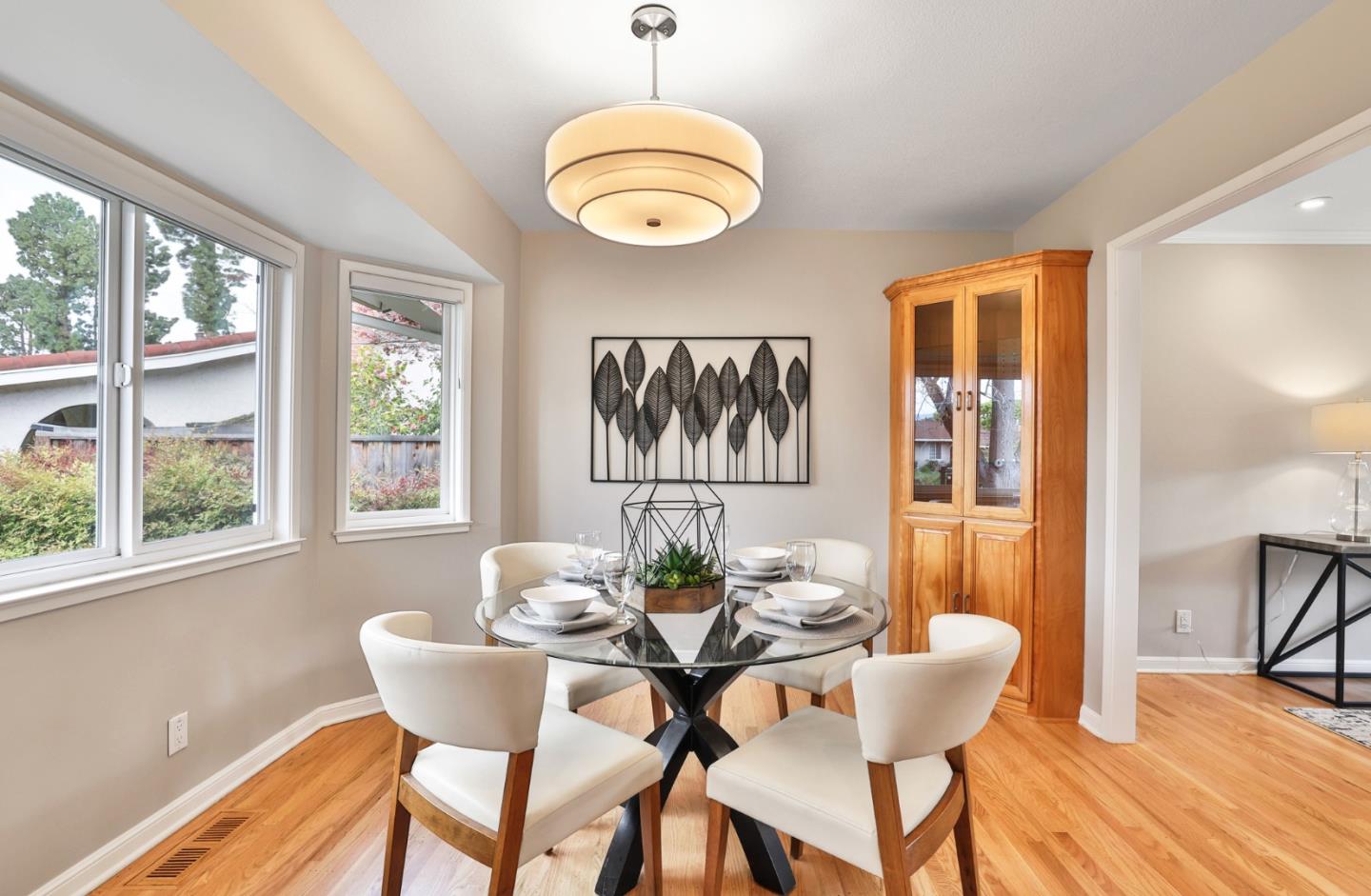 148 Jacinto Way Sunnyvale, CA 94086 - Photo 9 of 27 a dining room with furniture a rug and a large window