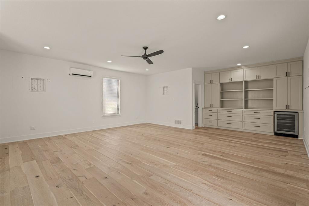 227 High View Trail Aledo, TX 76008 - Photo 29 of 40 wooden floor in an empty room with a window