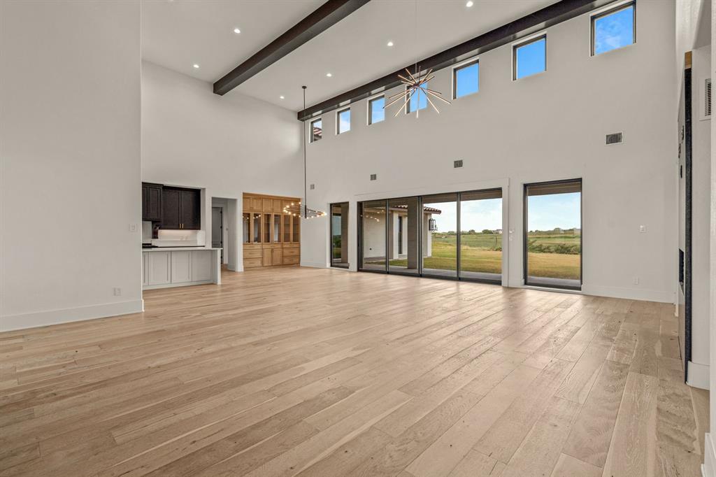227 High View Trail Aledo, TX 76008 - Photo 6 of 40 a view of an entryway with wooden floor