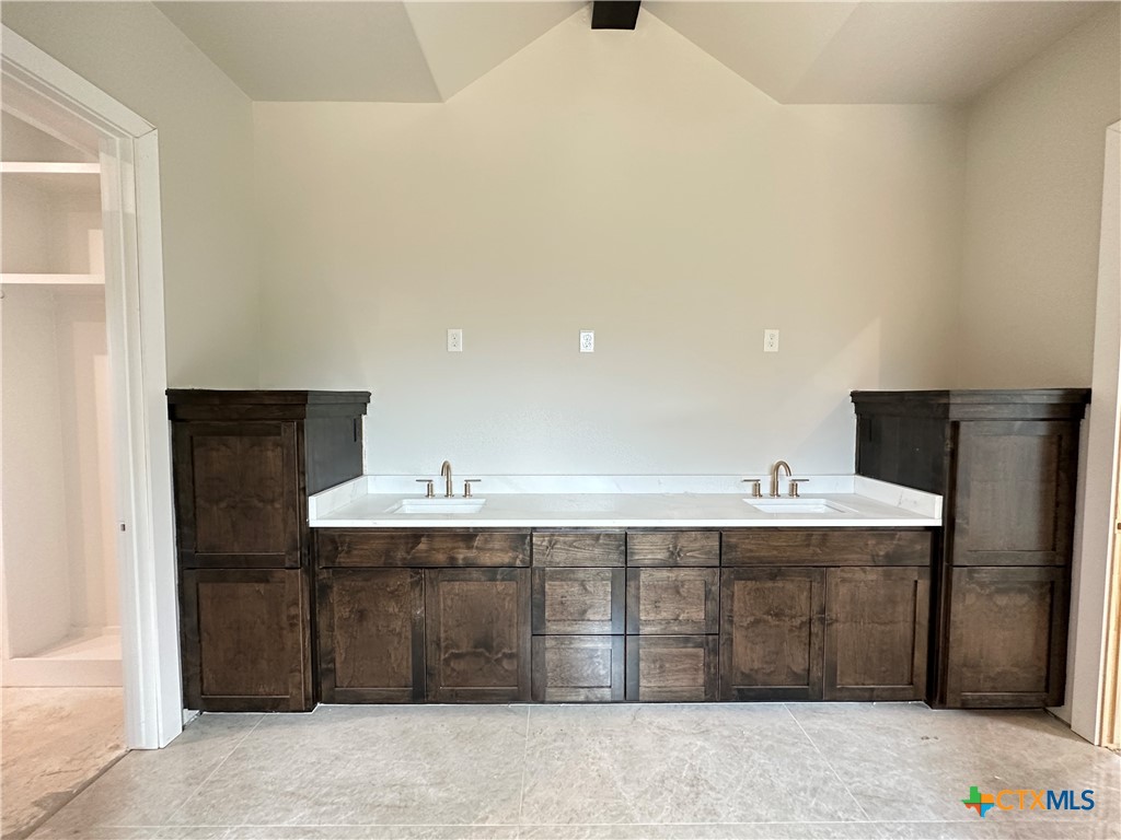 418 Dos Rios Drive Belton, TX 76513 - Photo 31 of 41 a kitchen with a sink and cabinets