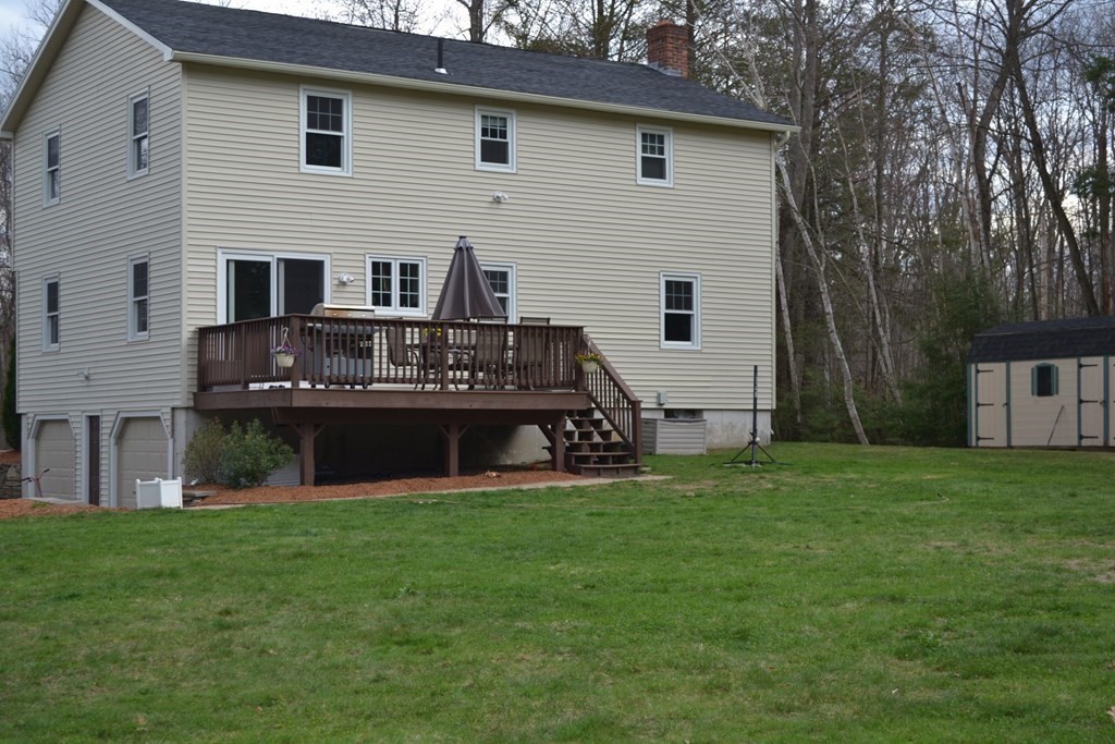 137 Center Depot Road Charlton, MA 01507 - Photo 29 of 31 a front view of house with yard and green space