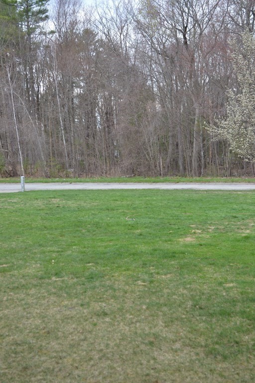 137 Center Depot Road Charlton, MA 01507 - Photo 30 of 31 a view of a field with trees in the background