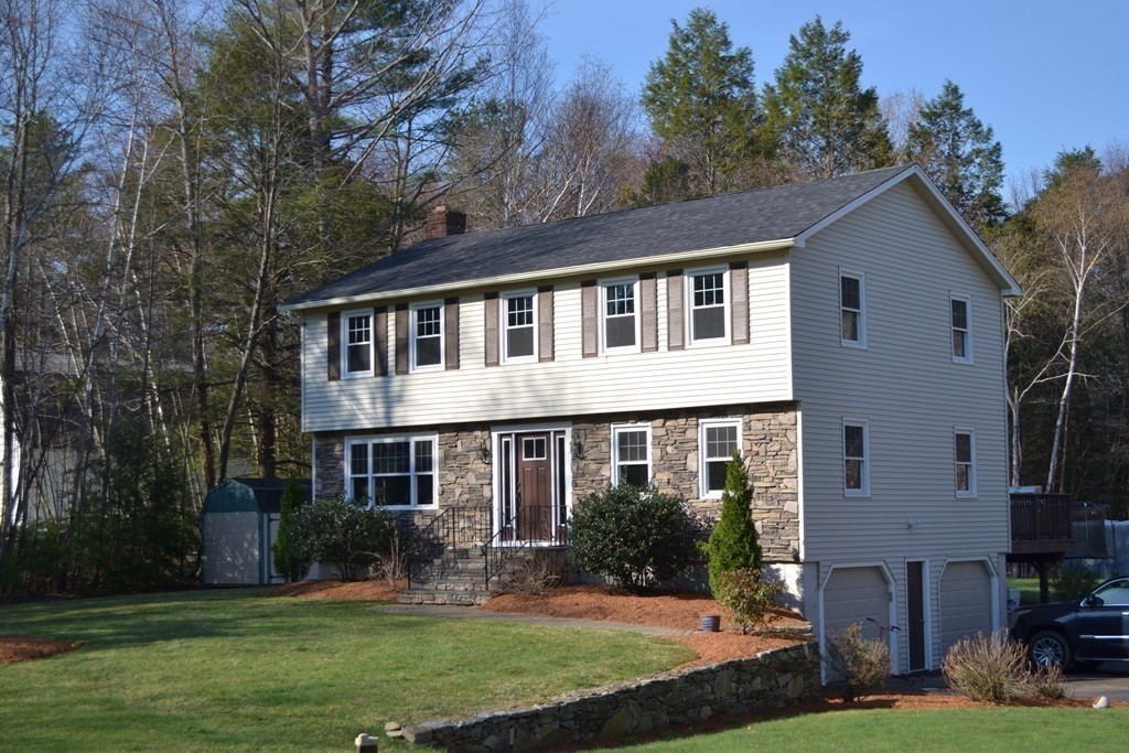 137 Center Depot Road Charlton, MA 01507 - Photo 3 of 31 front view of a house with a yard