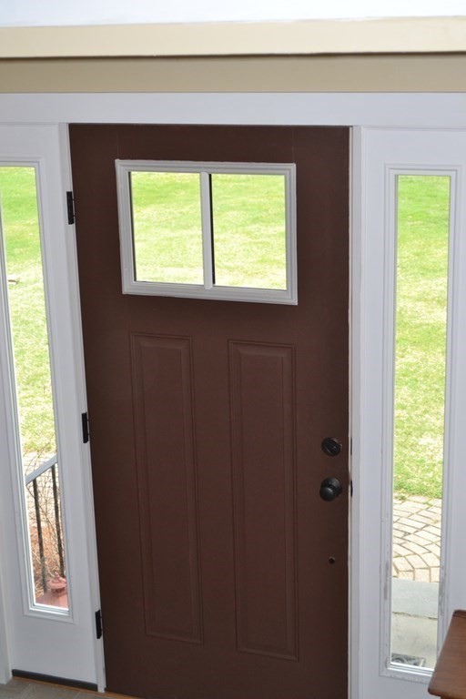 137 Center Depot Road Charlton, MA 01507 - Photo 4 of 31 a view of an entryway with a window