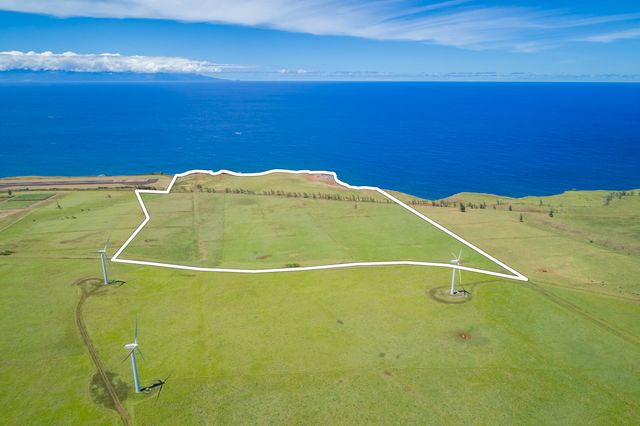 a blue swimming pool is in a blue room