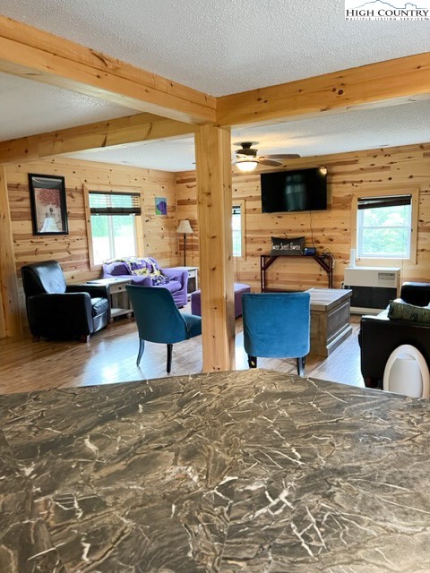 4122 Ridgeglen Road Sparta, NC 28675 - Photo 19 of 30 a living room with furniture and a flat screen tv