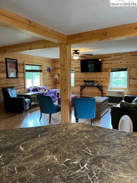 4122 Ridgeglen Road Sparta, NC 28675 - Photo 21 of 30 a living room with furniture and a open kitchen view