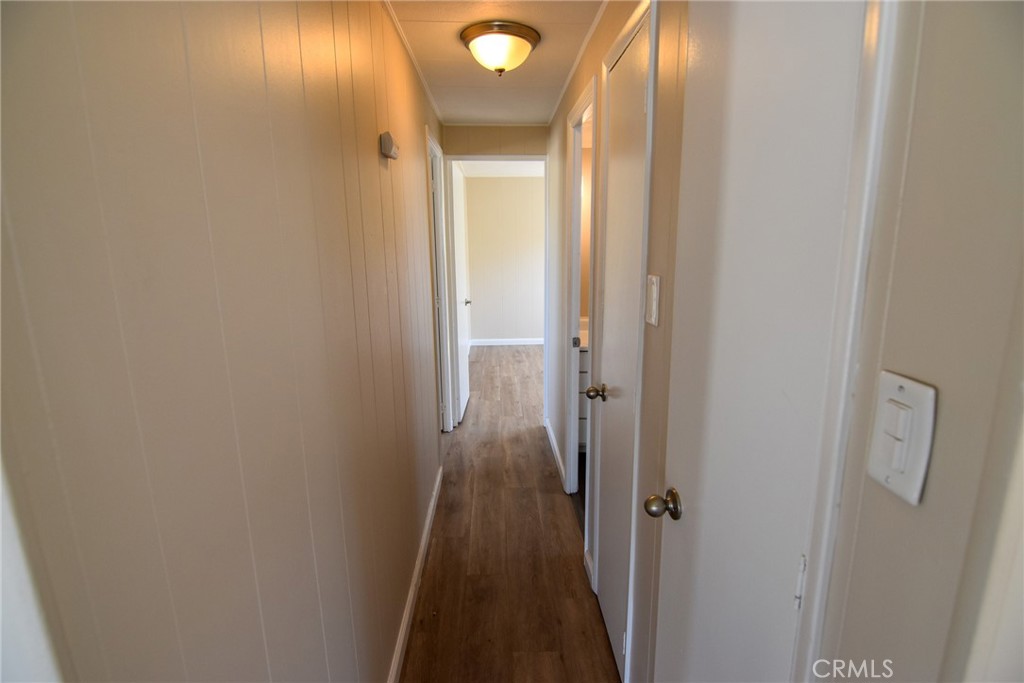 340 3rd Avenue, Unit 43 Pacifica, CA 94044 - Photo 11 of 19 a view of a bathroom from a corridor