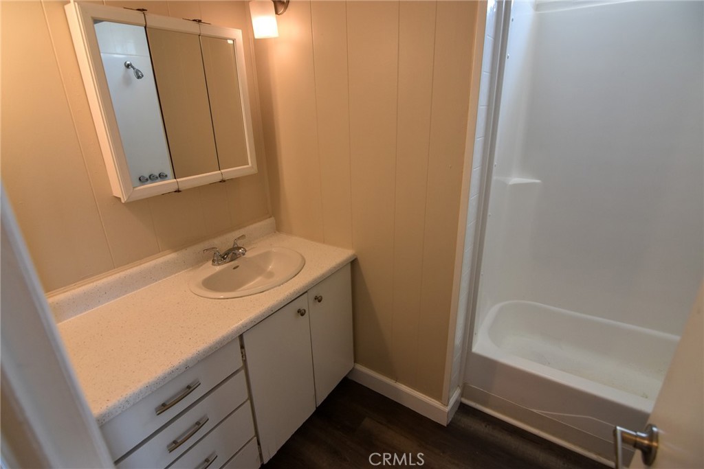 340 3rd Avenue, Unit 43 Pacifica, CA 94044 - Photo 13 of 19 a bathroom with a sink and a mirror