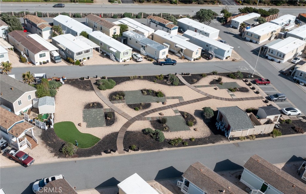 340 3rd Avenue, Unit 43 Pacifica, CA 94044 - Photo 18 of 19 an aerial view of a house with a lot of car parked