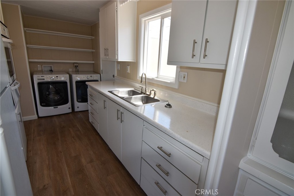 340 3rd Avenue, Unit 43 Pacifica, CA 94044 - Photo 9 of 19 a kitchen with a sink a stove and cabinets