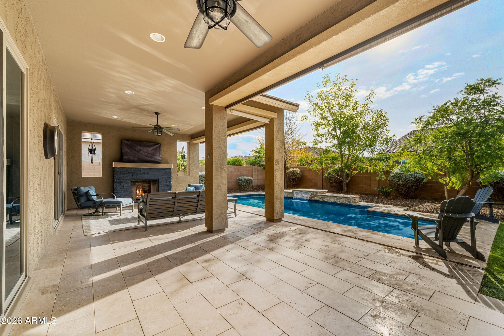 3921 East Chestnut Lane Gilbert, AZ 85298 - Photo 13 of 18 a building outdoor space with patio furniture and potted plants