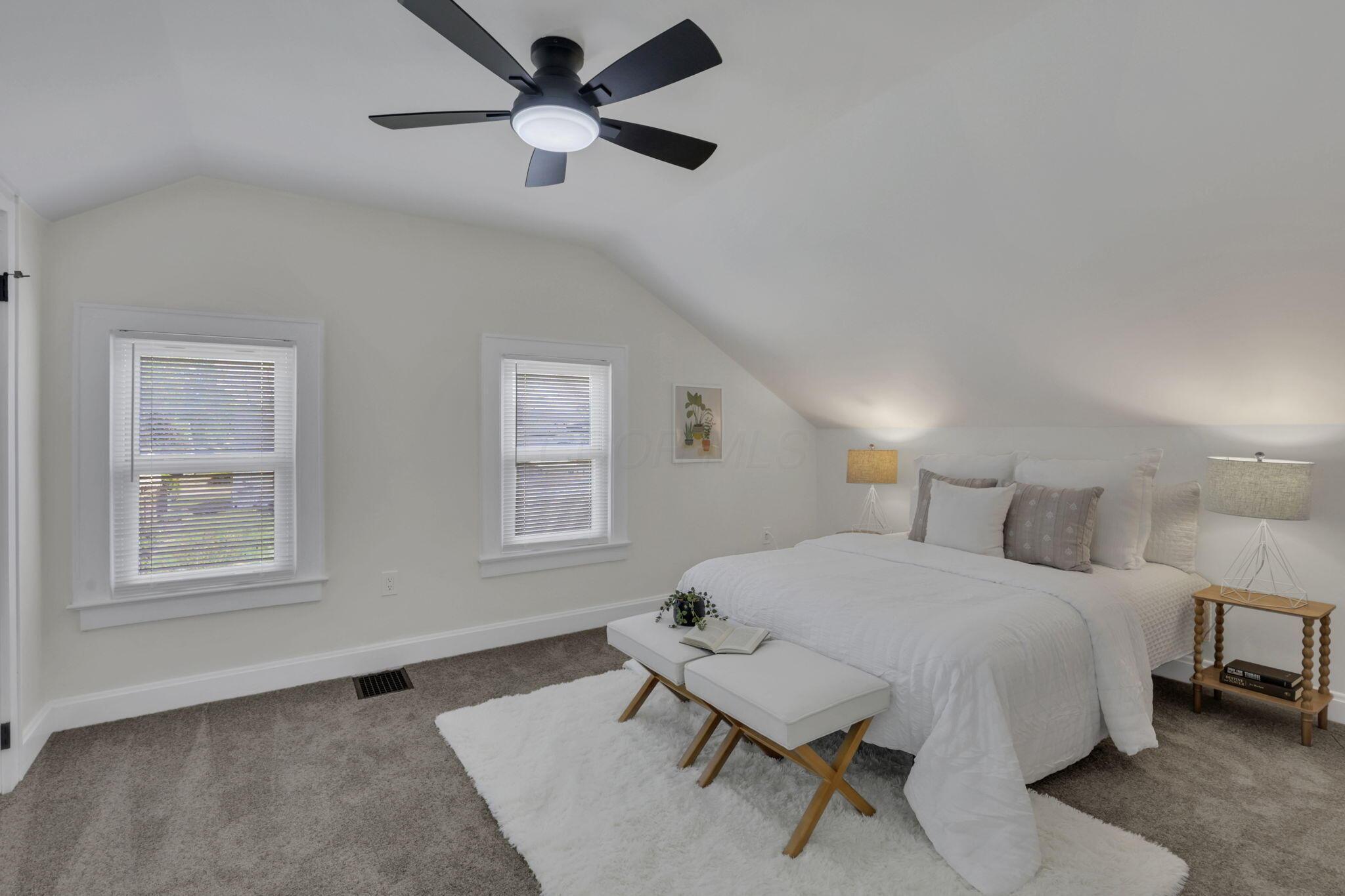 800 South Yearling Road Columbus, OH 43213 - Photo 23 of 57 Primary bedroom is very spacious and has new carpeting and new ceiling fan.
