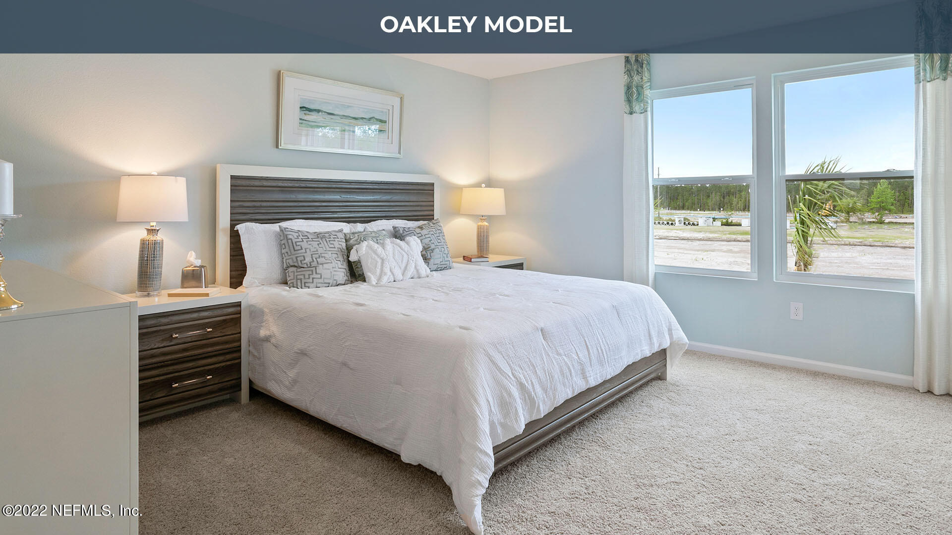 79 Ember Street St. Augustine, FL 32092 - Photo 9 of 31 a bedroom with a bed and a large window