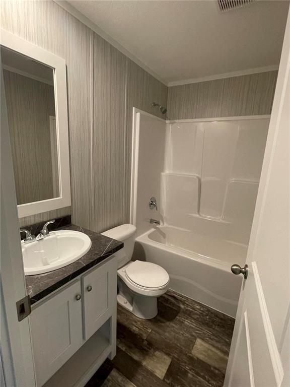 5118 A Holly Road Mount Pleasant, PA 15666 - Photo 14 of 17 a bathroom with a sink a toilet a mirror and shower