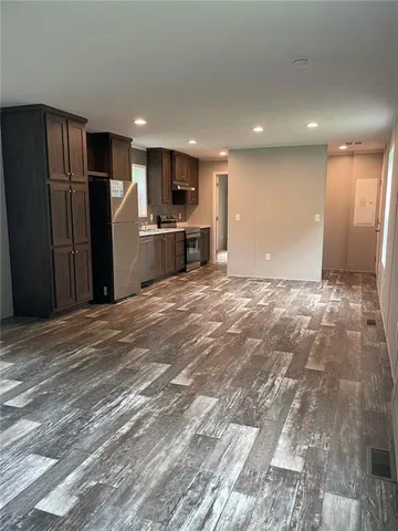 a view of a kitchen with a sink