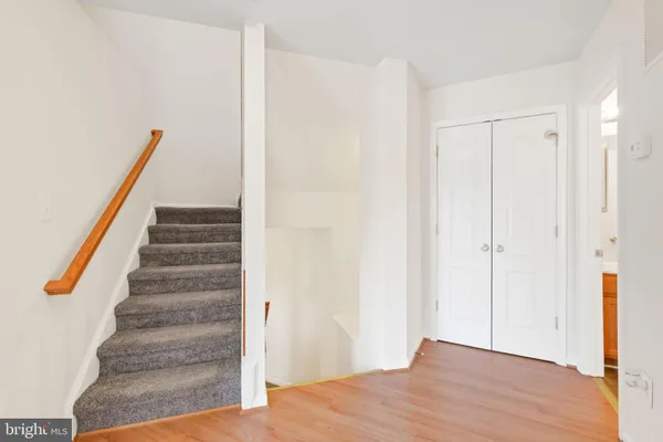 a view of entryway with wooden floor