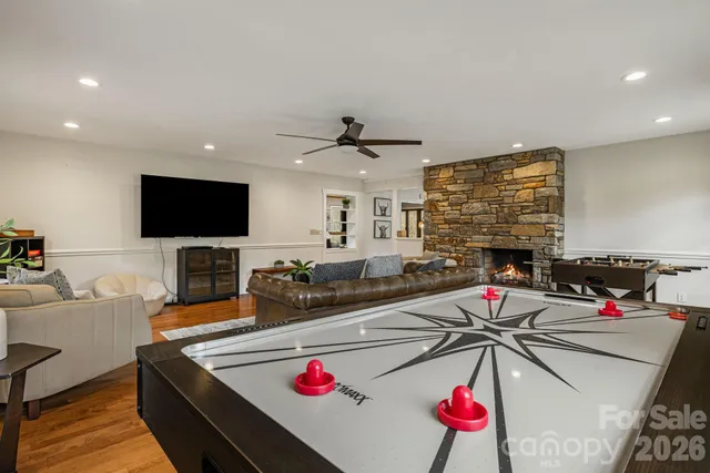 a very nice looking living room with a flat screen tv