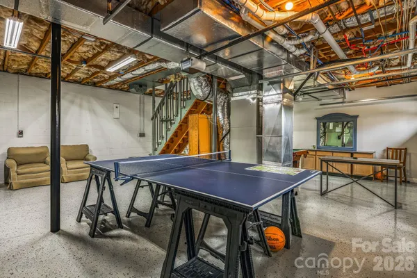 a patio with water table and chairs