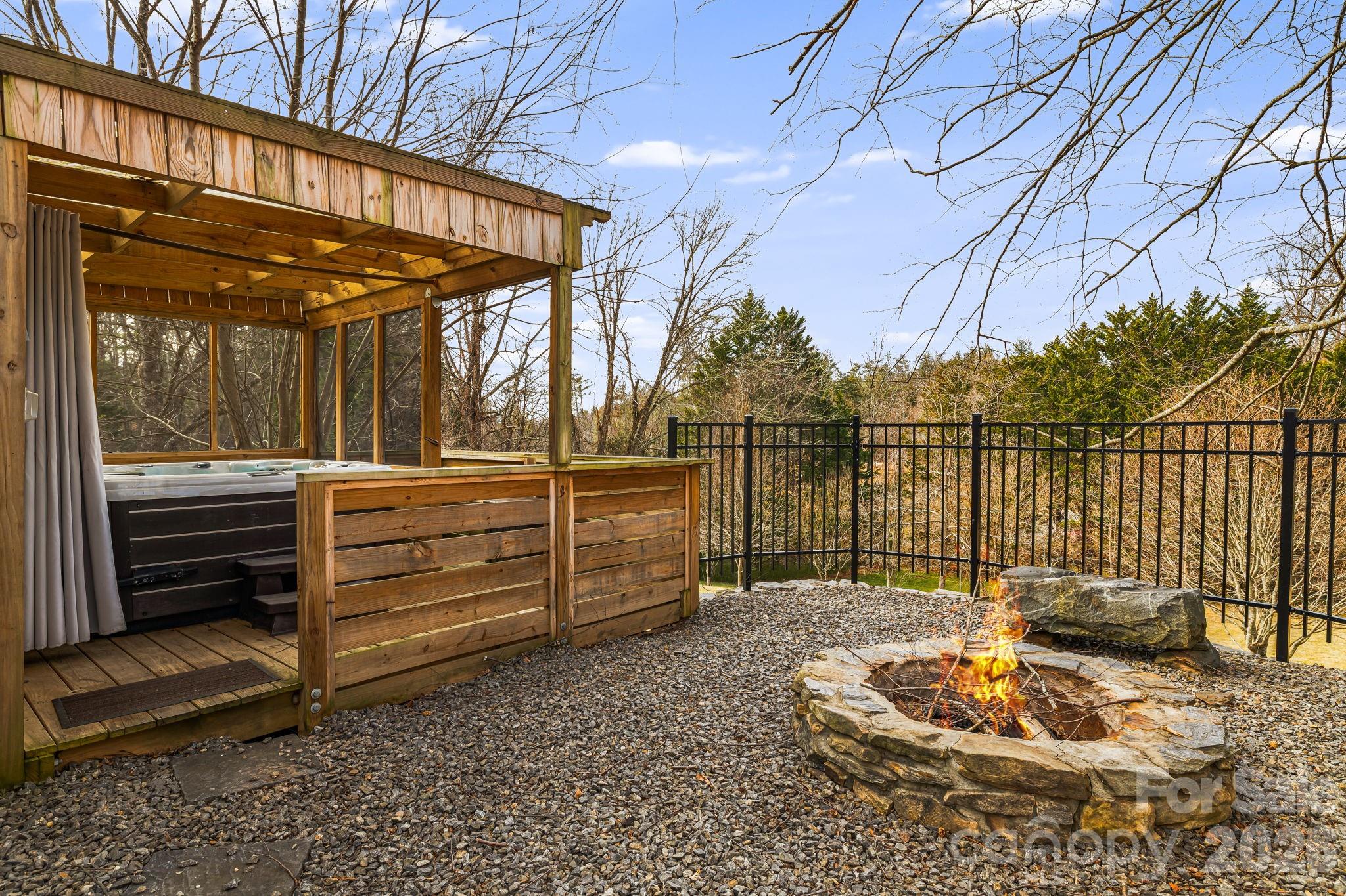 1236 Upper Brush Creek Road Fairview, NC 28730 - Photo 39 of 47 a view of a backyard with sitting area