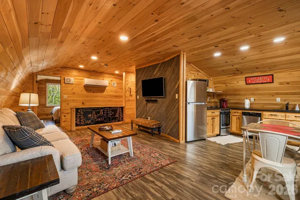 a outdoor space with patio furniture and a fireplace