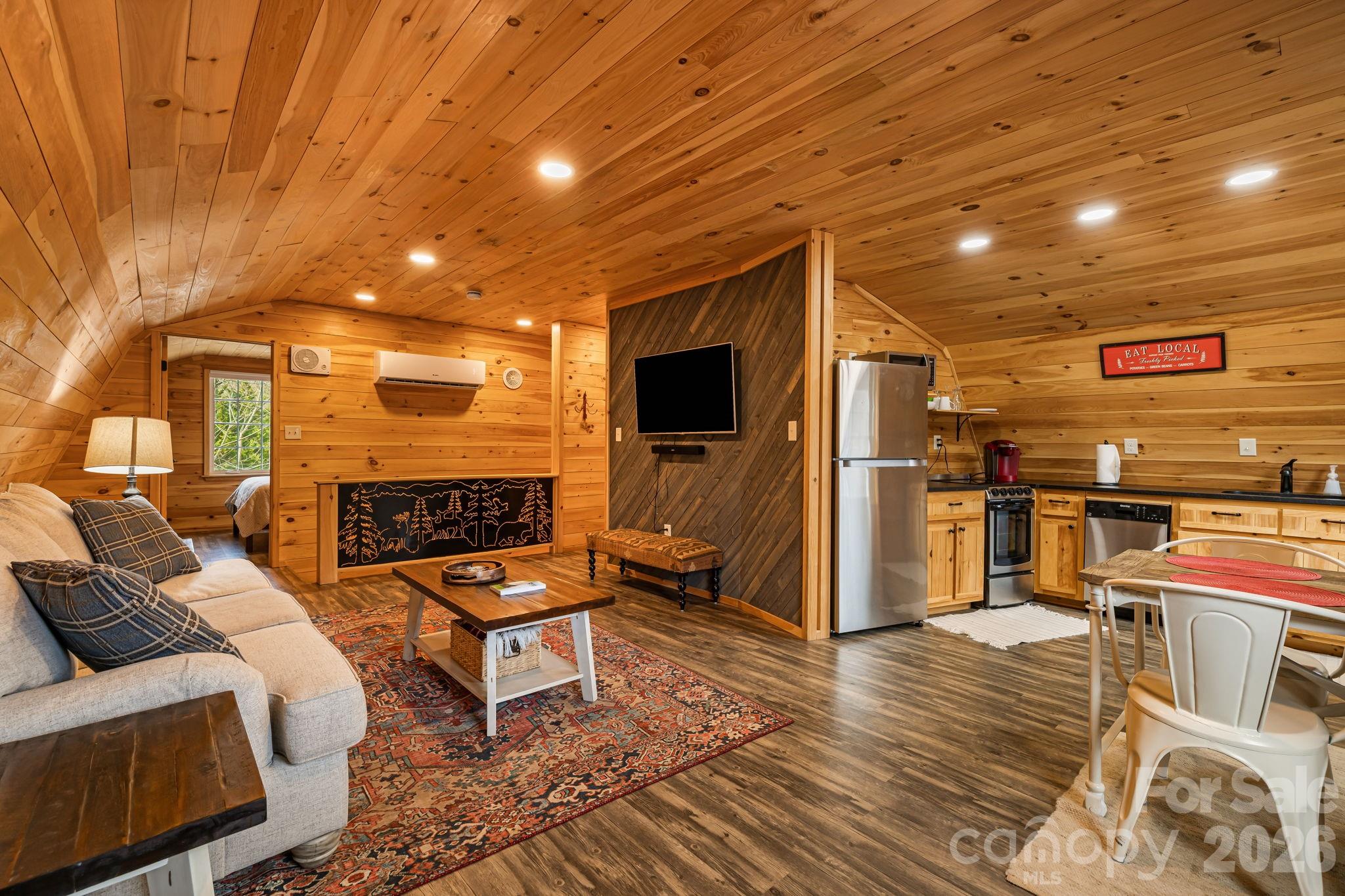 1236 Upper Brush Creek Road Fairview, NC 28730 - Photo 43 of 48 a outdoor space with patio furniture and a fireplace