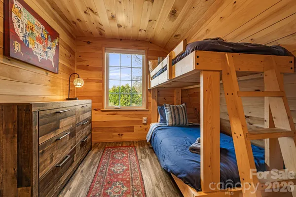 a view of balcony with wooden floor