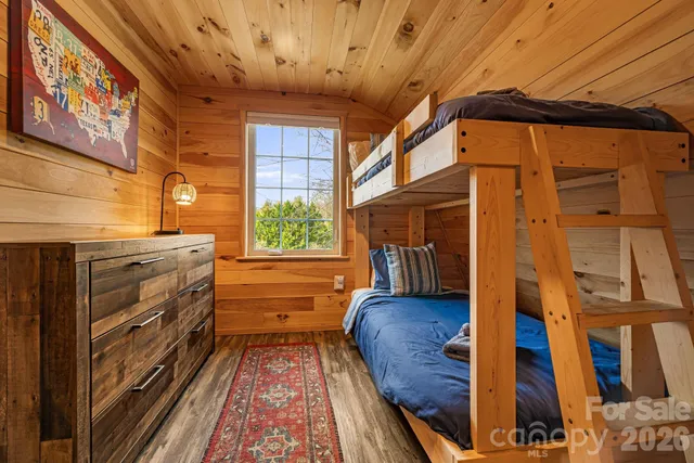 a view of balcony with wooden floor