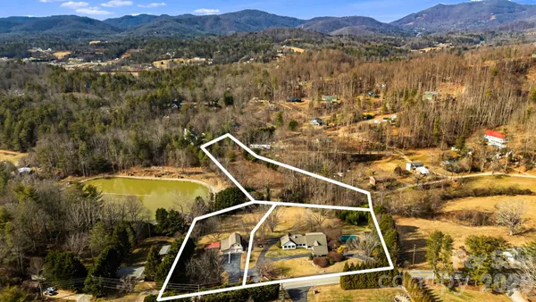 a view of a balcony with an outdoor space and lakeside