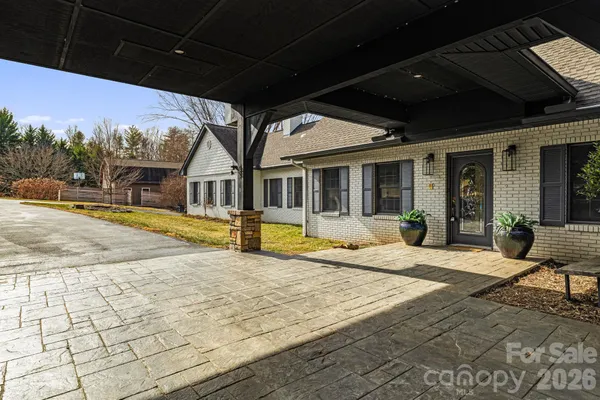 a view of swimming pool with seating space