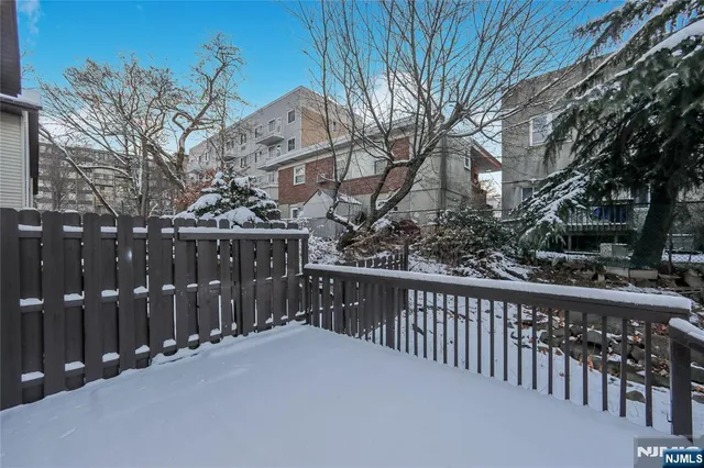 a view of a balcony with furniture