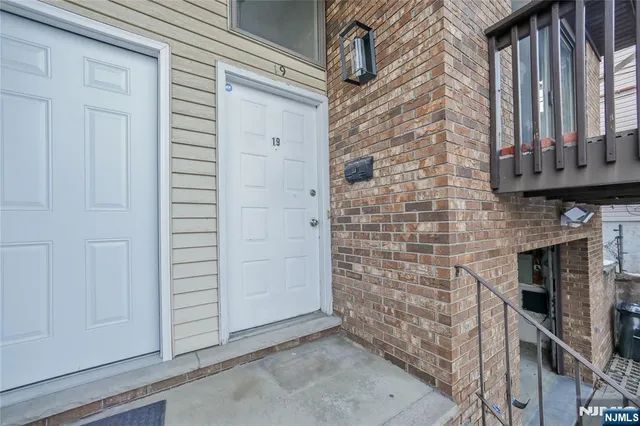 a view of a brick house with a shower
