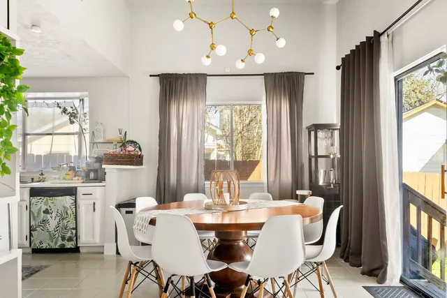 a close up of a sink with a bunch of kitchen