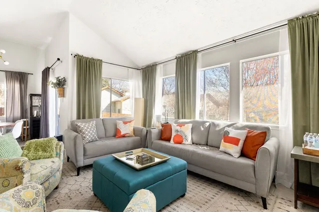 a view of a dining room with furniture window and outside view