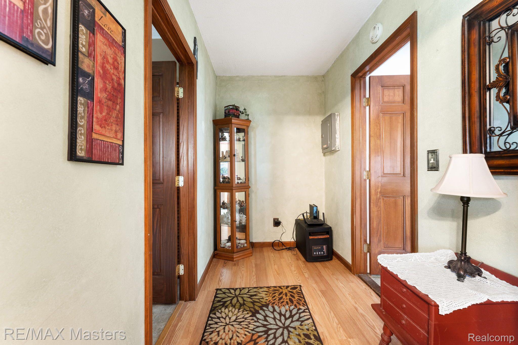 36540 Bismark Road New Boston, MI 48164 - Photo 16 of 25 Hallway between bathroom & laundry room