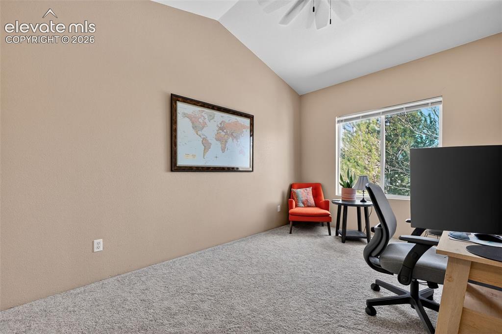 2141 Legacy Ridge View, Unit 109 Colorado Springs, CO 80910 - Photo 11 of 23 a view of a workspace with furniture and a window