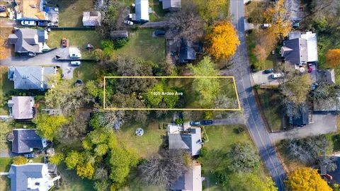 an aerial view of houses and roads