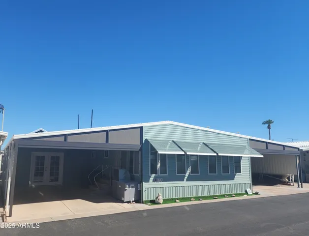 a front view of a house with a garage