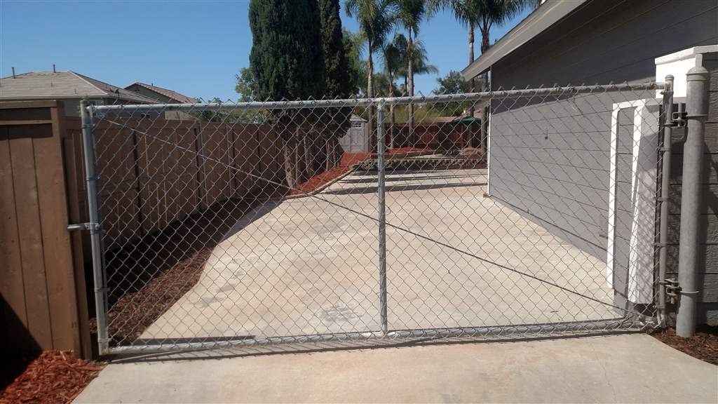 10120 Ranchitos Place Lakeside, CA 92040 - Photo 4 of 16 Massive concrete secure parking area off street large enough for numerous cars, or several suv's. work vehicles, boats etc.