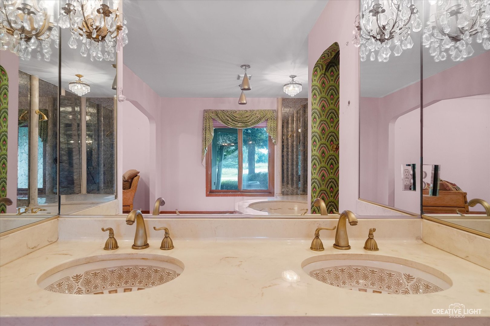 16323 Griswold Springs Road Plano, IL 60545 - Photo 20 of 55 a bathroom with a sink and a mirror