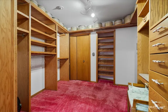 a bathroom with a mirror and a shower