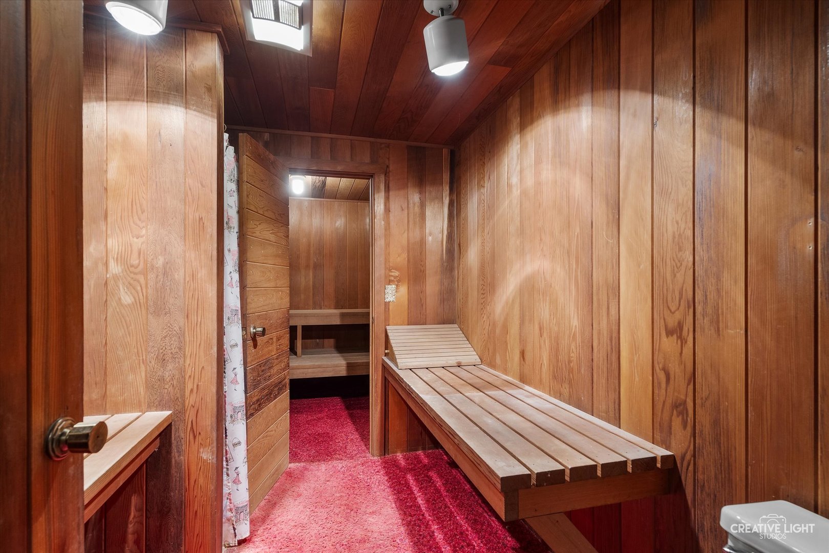 16323 Griswold Springs Road Plano, IL 60545 - Photo 27 of 55 a bedroom with a bed and a chandelier