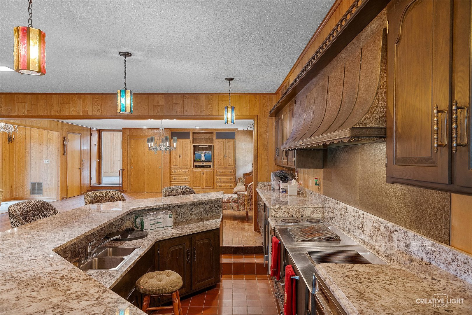 16323 Griswold Springs Road Plano, IL 60545 - Photo 9 of 55 a kitchen with a sink stove and cabinets