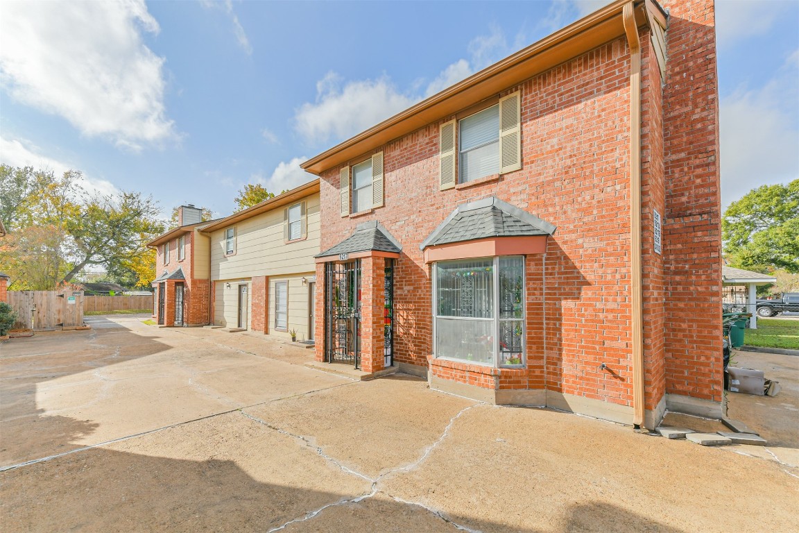 9217 Carousel Lane Houston, TX 77080 - Photo 2 of 38 a view of a house with a patio