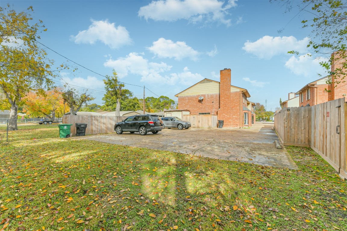 9217 Carousel Lane Houston, TX 77080 - Photo 9 of 38 a front view of a house with a yard