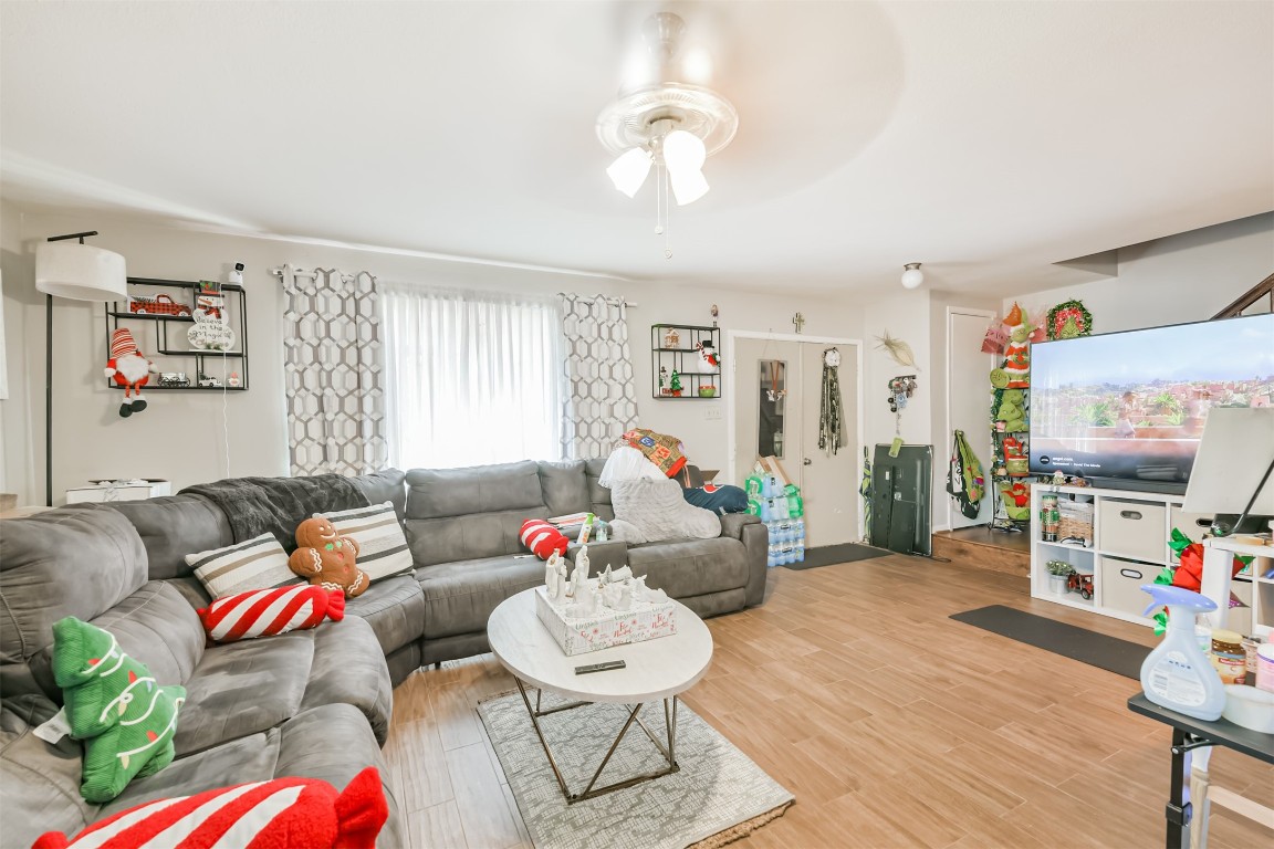 9217 Carousel Lane Houston, TX 77080 - Photo 10 of 38 a living room with furniture and a wooden floor