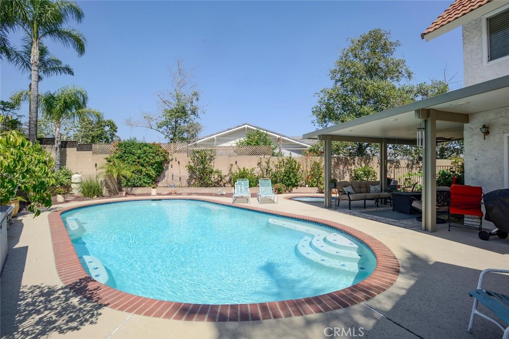 10424 Cartilla Court Rancho Cucamonga, CA 91737 - Photo 35 of 36 an outdoor space with swimming pool and furniture