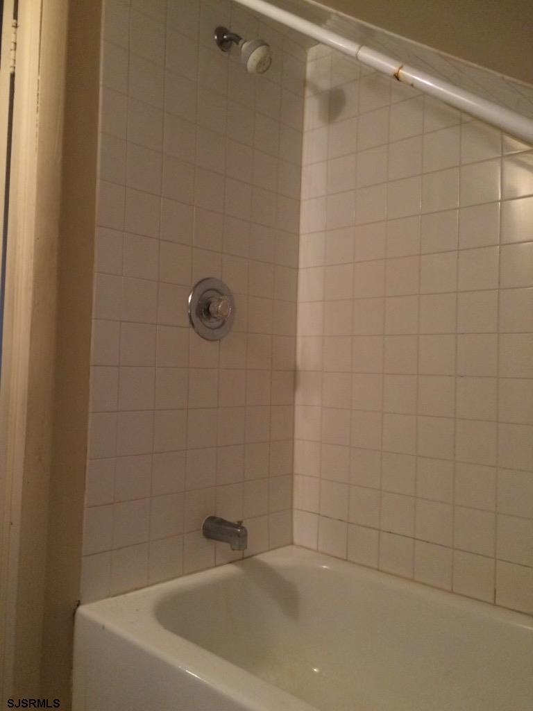 237 Marlin Road Absecon, NJ 08201 - Photo 18 of 25 a bathroom with a white bath tub and a shower